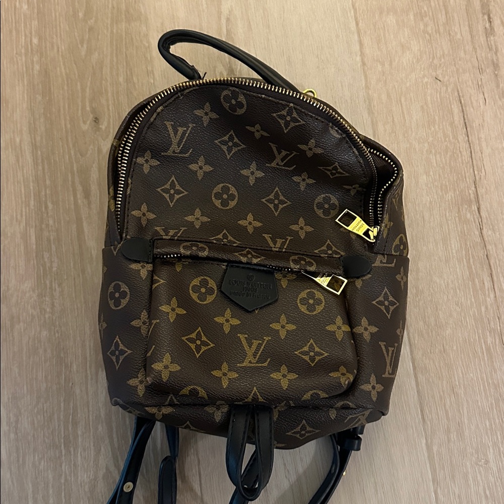 FAKE Brown and Gold Monogram mini Backpack